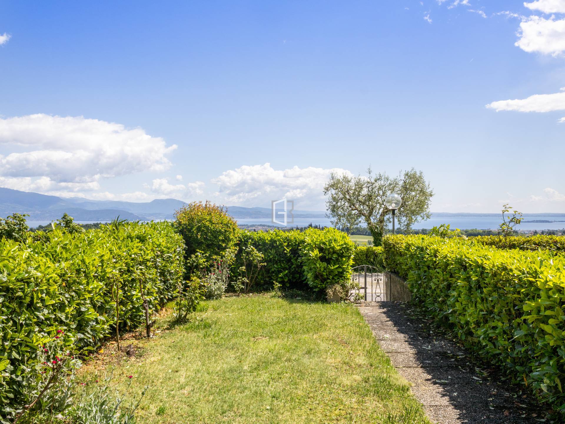 Muscoline – 2-Zimmer-Erdgeschosswohnung mit Garten und spektakulärem Seeblick
